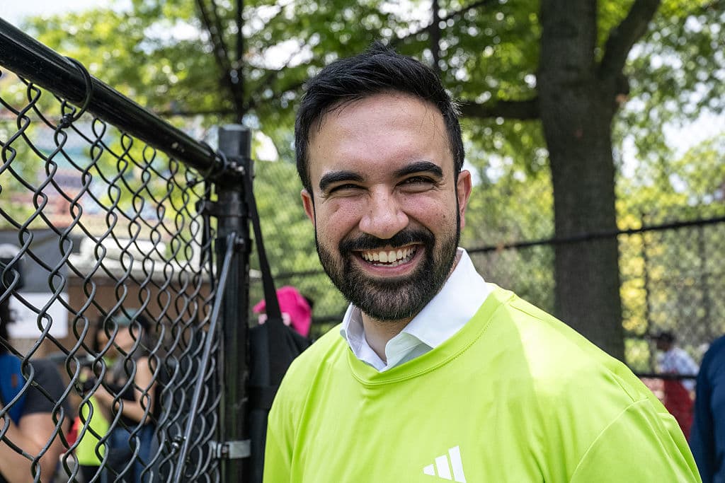 NEW YORK, NEW YORK - JUNE 19: Mayoral candidate, Zohran Mamdani, visits the Recess Juneteenth Kickball tournament on June 19, 2025 in the borough of Brooklyn in New York, New York. A community organization, Recess, hosts a kickball league that starts on the Juneteenth holiday that mixes culture, party and sports. (Photo by Stephanie Keith 100584/Getty Images)
